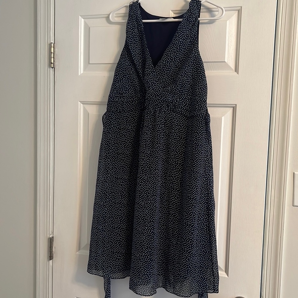 Navy sleeveless MATERNITY dress with belt.